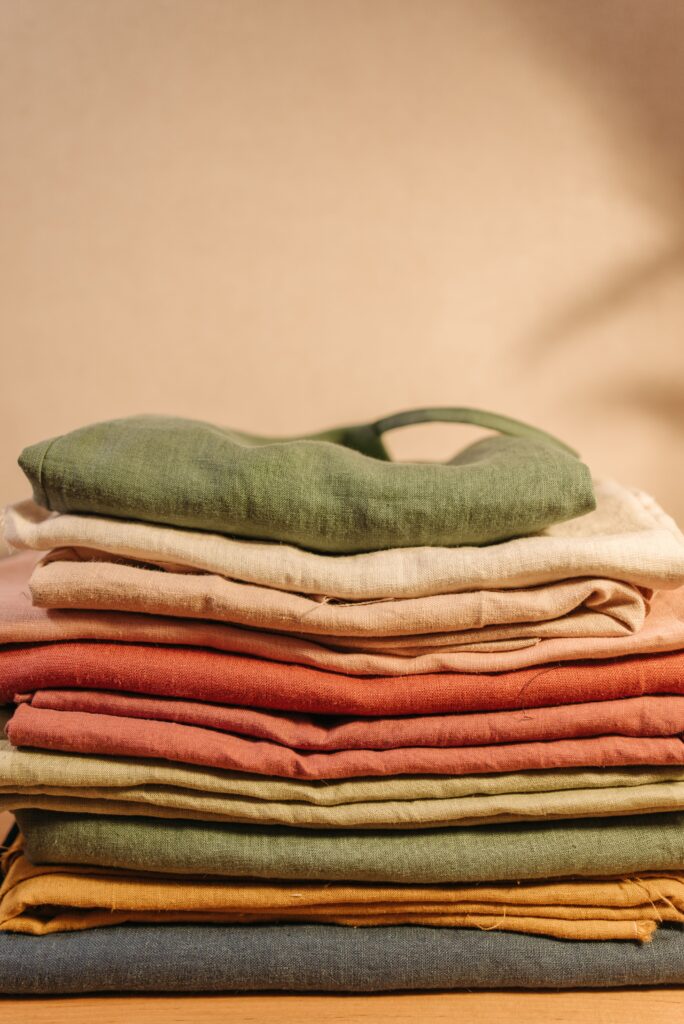 artistic pile of organic clothes